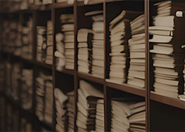 old papers on shelves